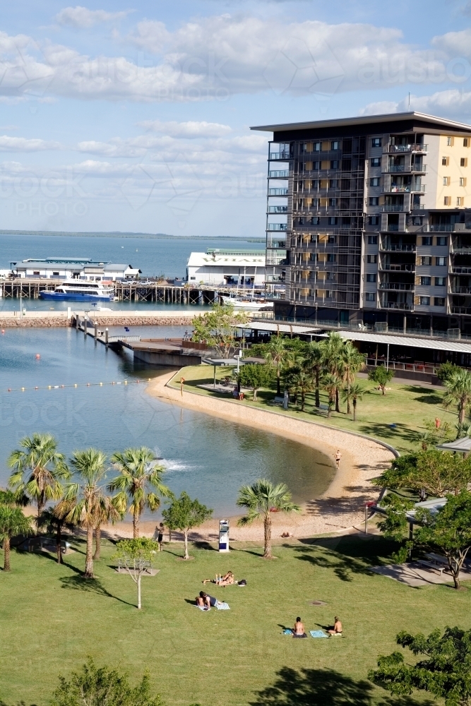 View of waterfront apartments and parkland surrounding Darwin harbour and lagoon - Australian Stock Image