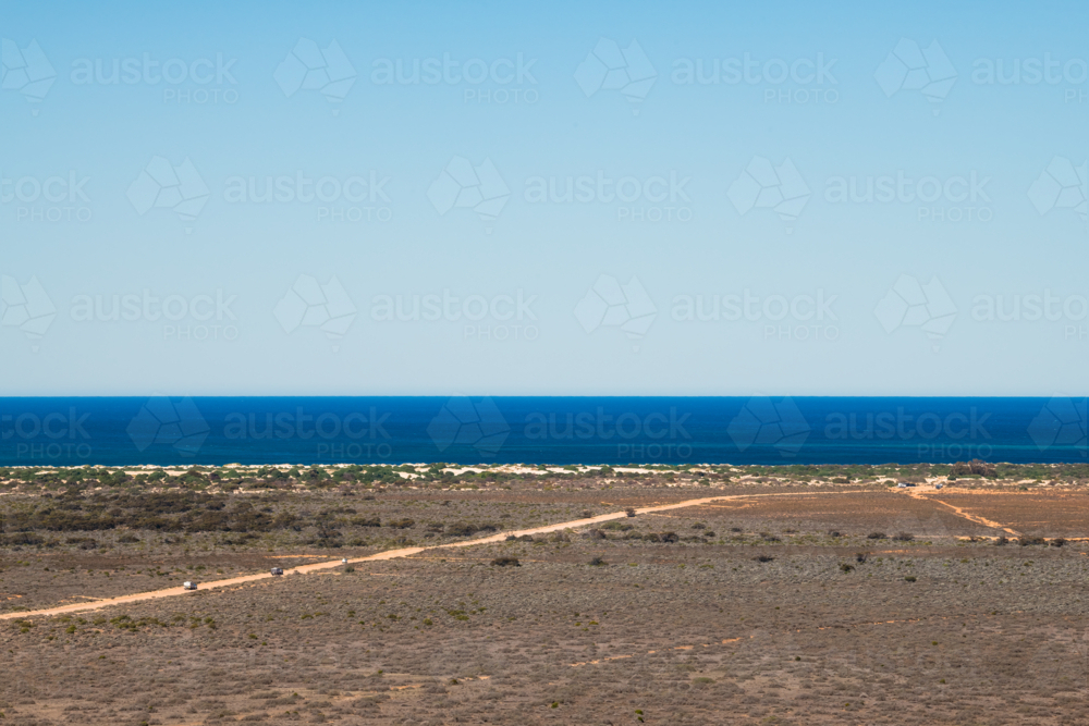 View on top of the escarpment looking towards the blue ocean, Eucla, Western Australia - Australian Stock Image