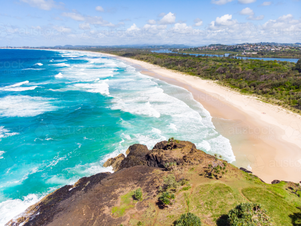 view over Wommin Bay from Fingal Head lighthouse towards Kingscliff in New South Wales - Australian Stock Image