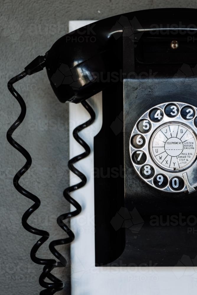 vintage black wall phone - Australian Stock Image