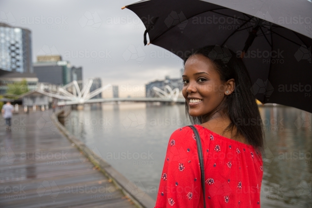 Walking by the Yarra River in the Rain - Australian Stock Image