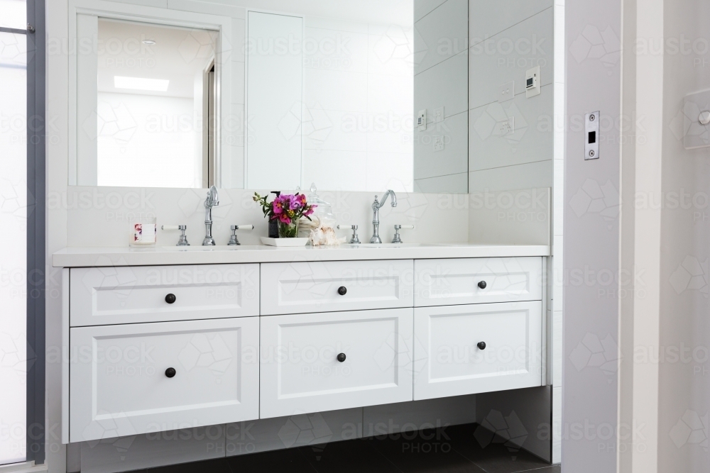 Wall Hung Vanity In A Luxury Hamptons Styled Bathroom Austockphoto 000063706 ?v=1.2.3