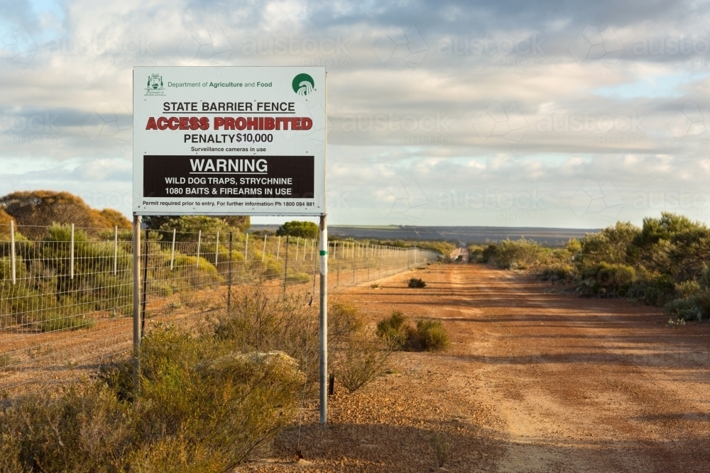 Warning Sign on the state barrier fence - Australian Stock Image