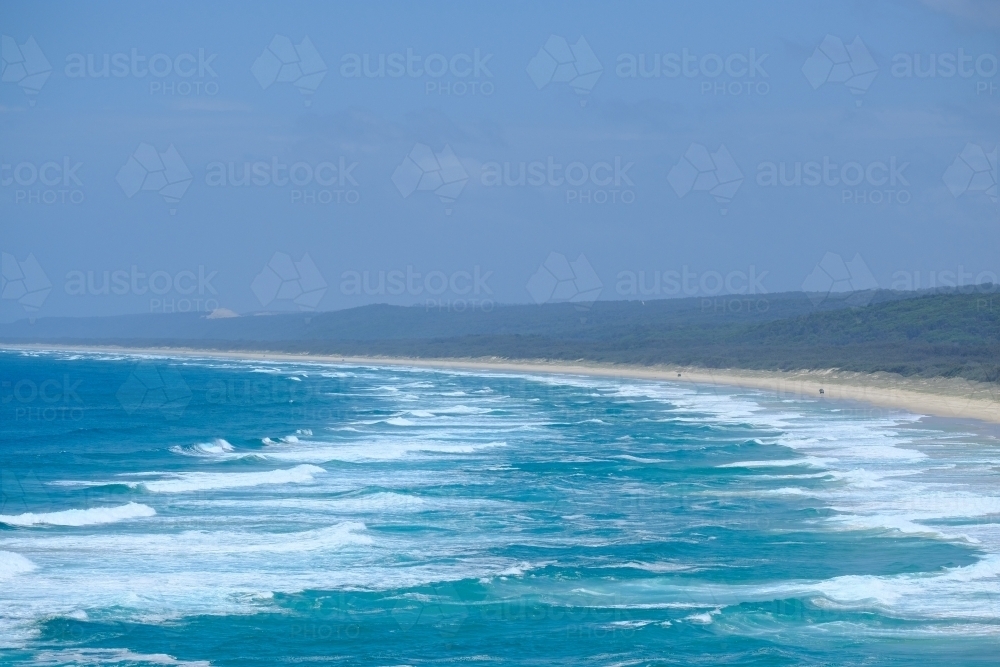 Waves breaking along Main Beach, Straddie - Australian Stock Image