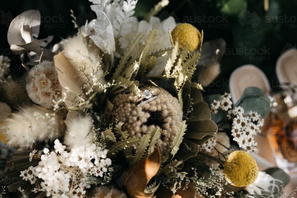 Wedding ring in wedding flowers - Australian Stock Image