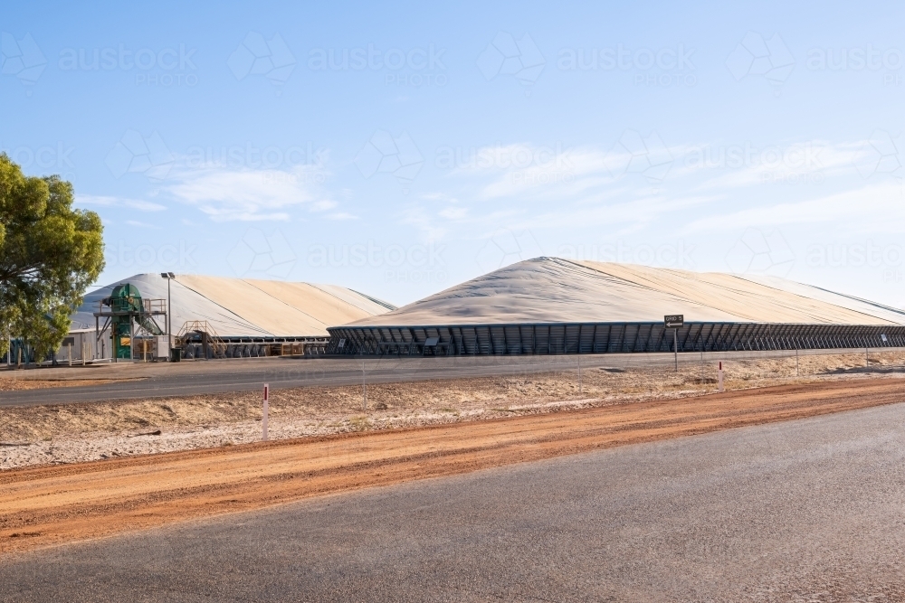 Wheat silos near road in country town - Australian Stock Image