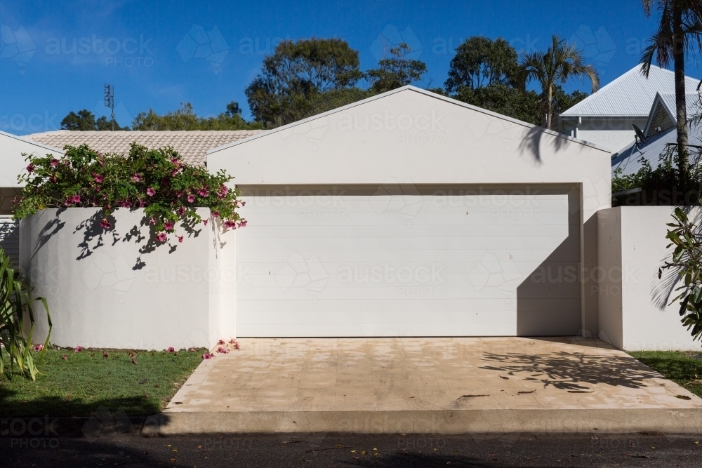 white garage door and driveway - Australian Stock Image