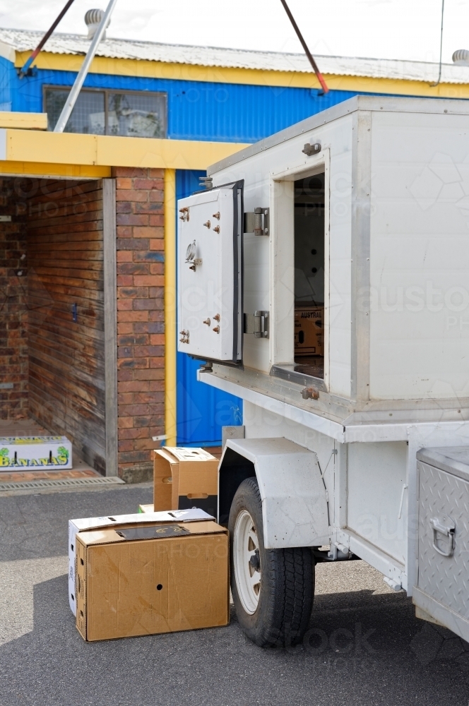 White refrigerated trailer used to transport fresh produce to the collection point - Australian Stock Image