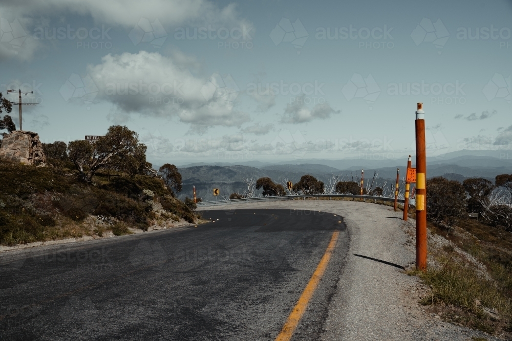 Winding mountain road. Feathertop via Razorback trailhead start. Great alpine road, Mount Hotham. - Australian Stock Image