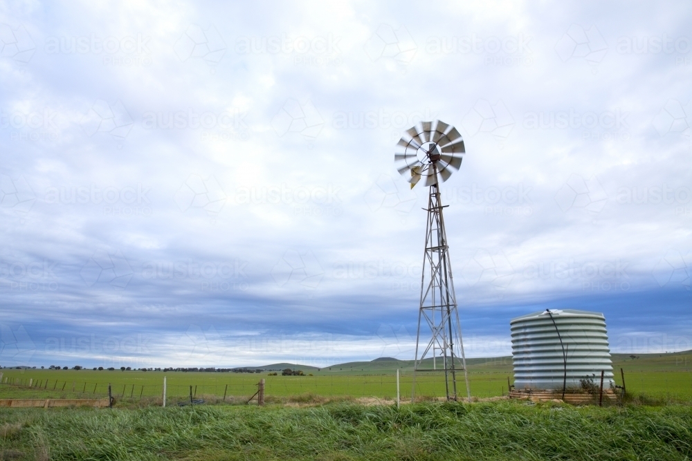 Windmill and tank on right - Australian Stock Image