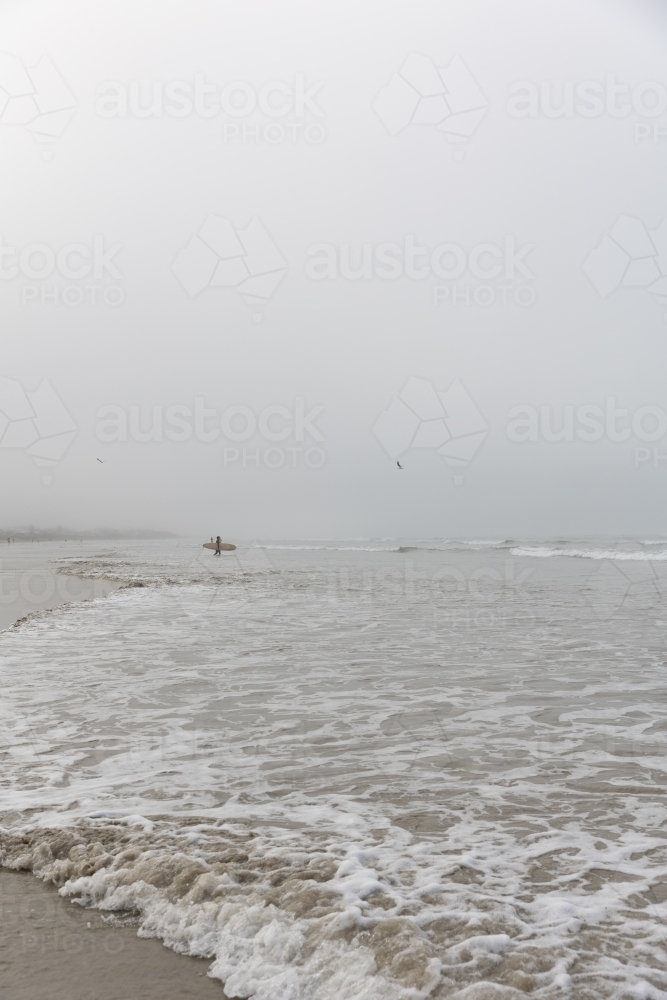 Winter foggy surf - Australian Stock Image