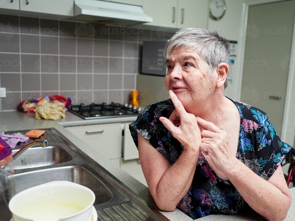 Woman in Her Kitchen - Australian Stock Image