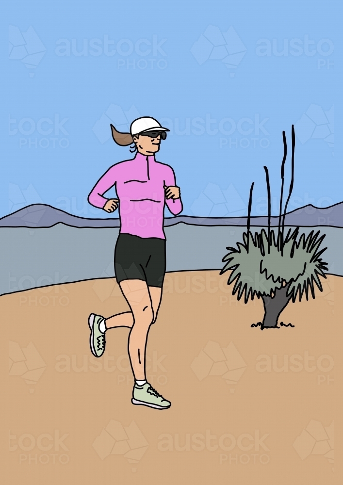 Woman running alone through Australian landscape with grass tree - Australian Stock Image