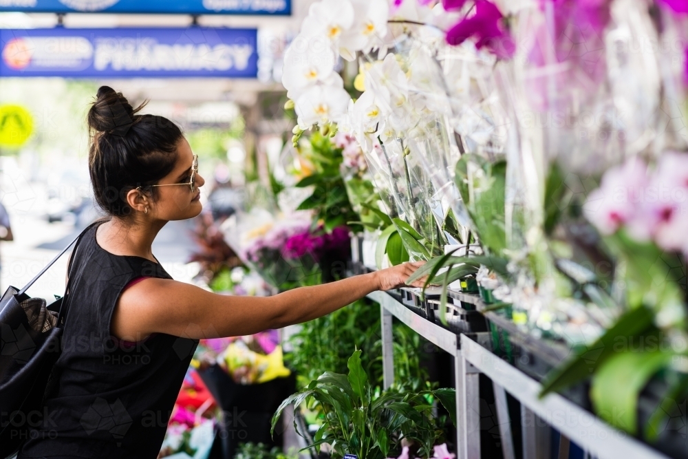 woman shopping at local market - Australian Stock Image