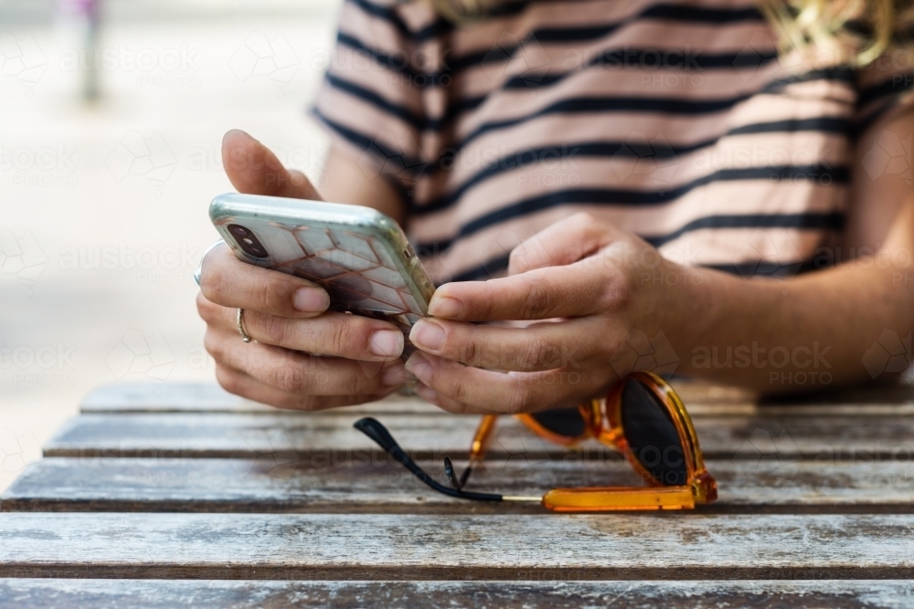 woman using mobile phone - Australian Stock Image