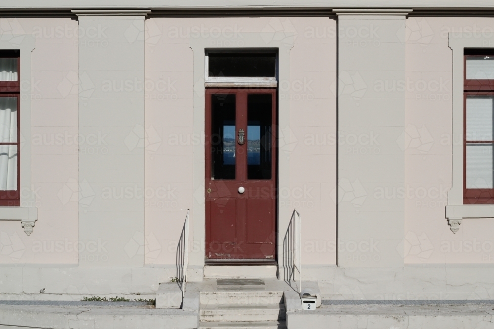 Wooden door with inserted glass panels - Australian Stock Image