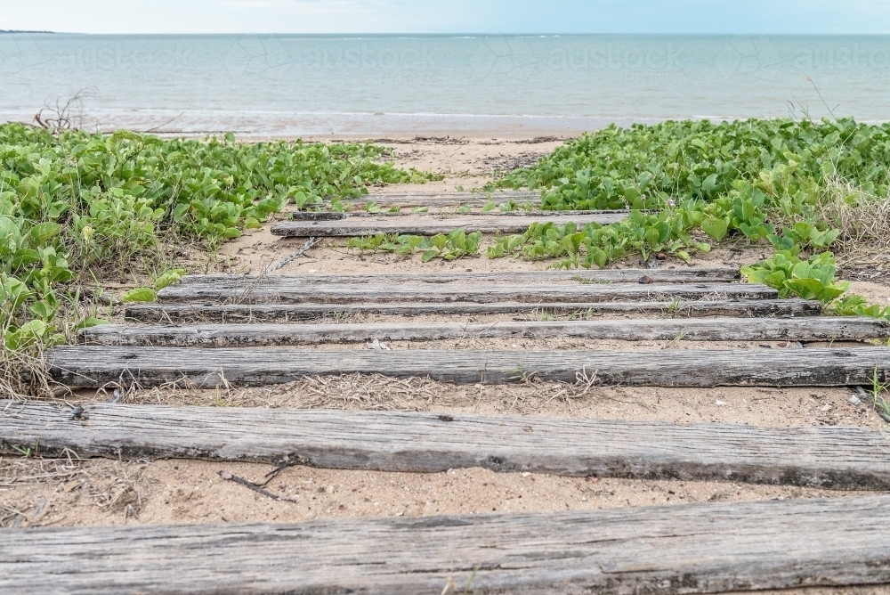 Wooden sleepers on path to beach - Australian Stock Image