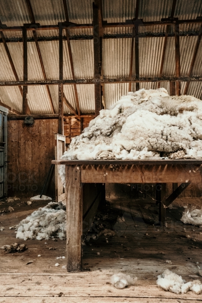 Wool sorting table with fleece in a historic wool shed. - Australian Stock Image