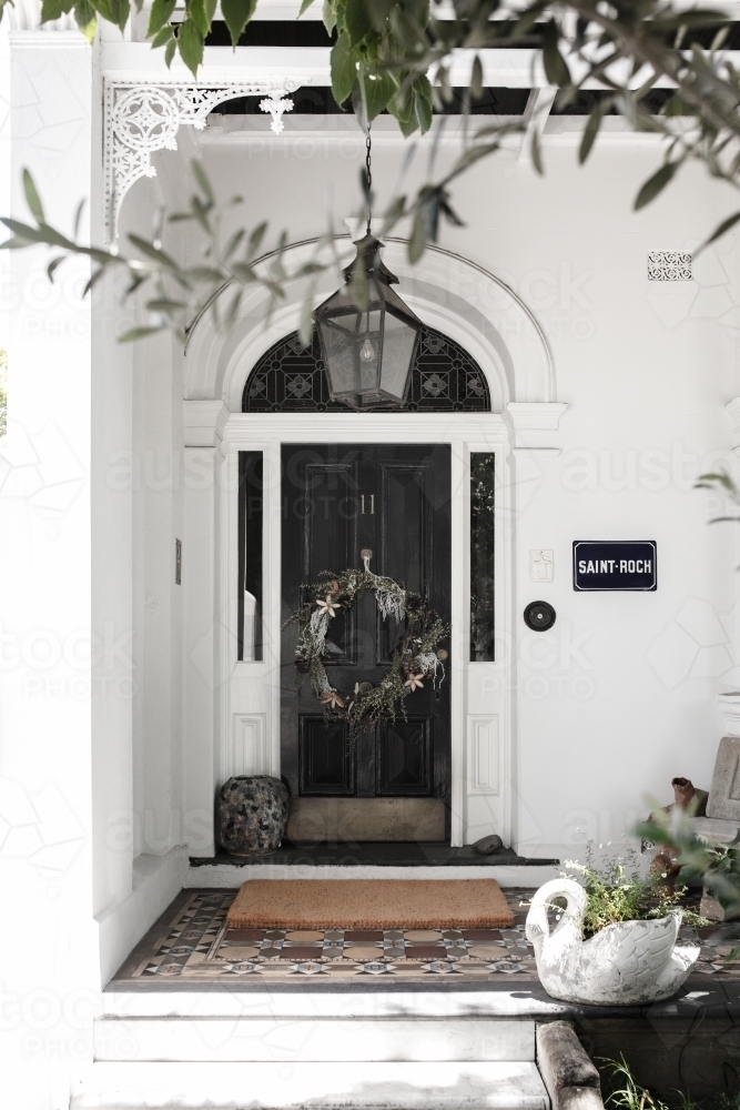 Wreath on black door - Australian Stock Image