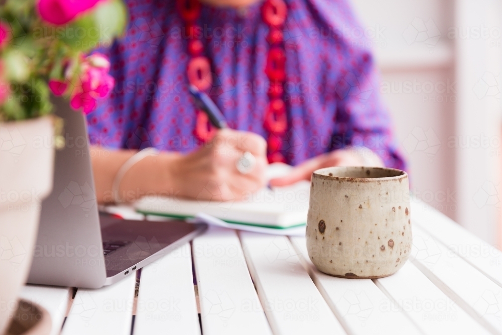 Writer taking notes - Australian Stock Image