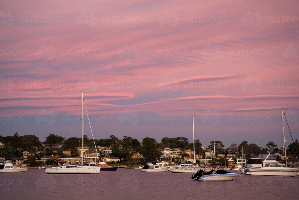 Yachts at mooring in Gunnamatta Bay at dawn - Australian Stock Image