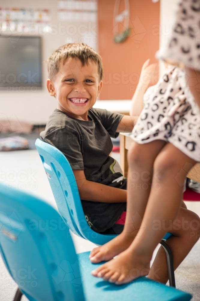 Young Aboriginal girl and boy at preschool - Australian Stock Image