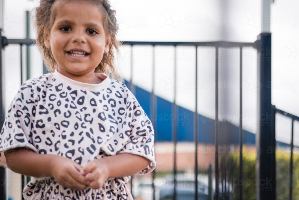 Young Aboriginal girl outside at preschool - Australian Stock Image