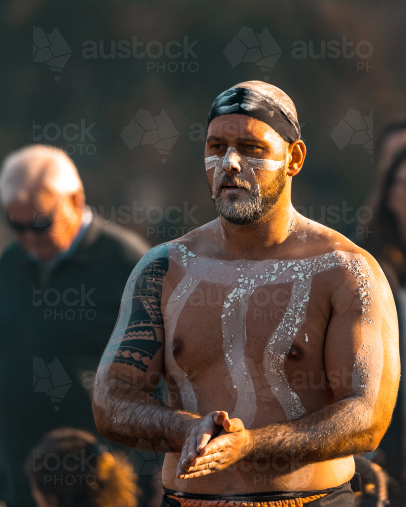 Young Aboriginal Male preparing for dance - Australian Stock Image
