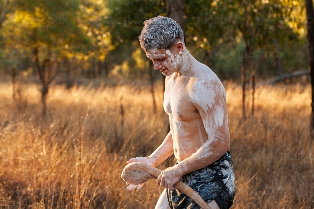 Young Aboriginal man - dance and storytelling - Australian Stock Image