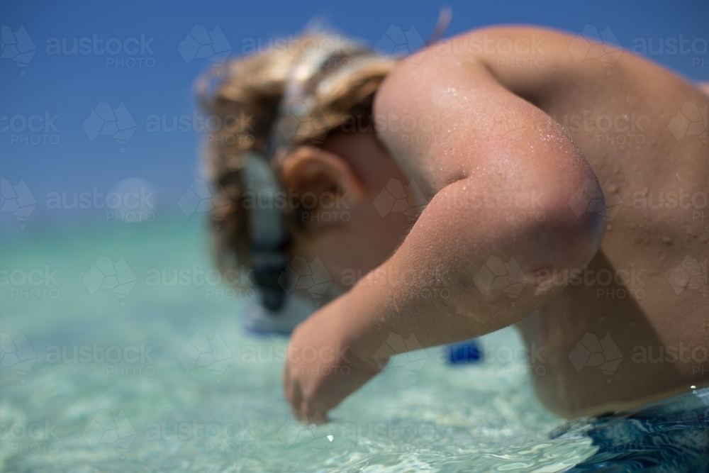 Young boy snorkeling - Australian Stock Image