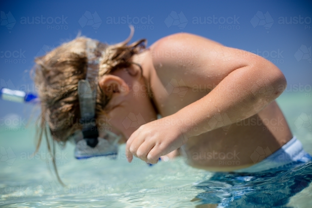 Young boy snorkeling - Australian Stock Image