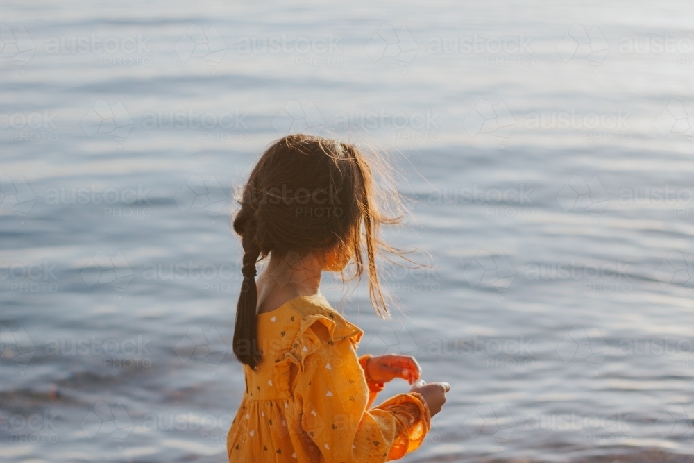 Young girl looking at the sea - Australian Stock Image