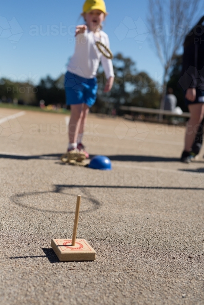 Young girl playing quoits - Australian Stock Image