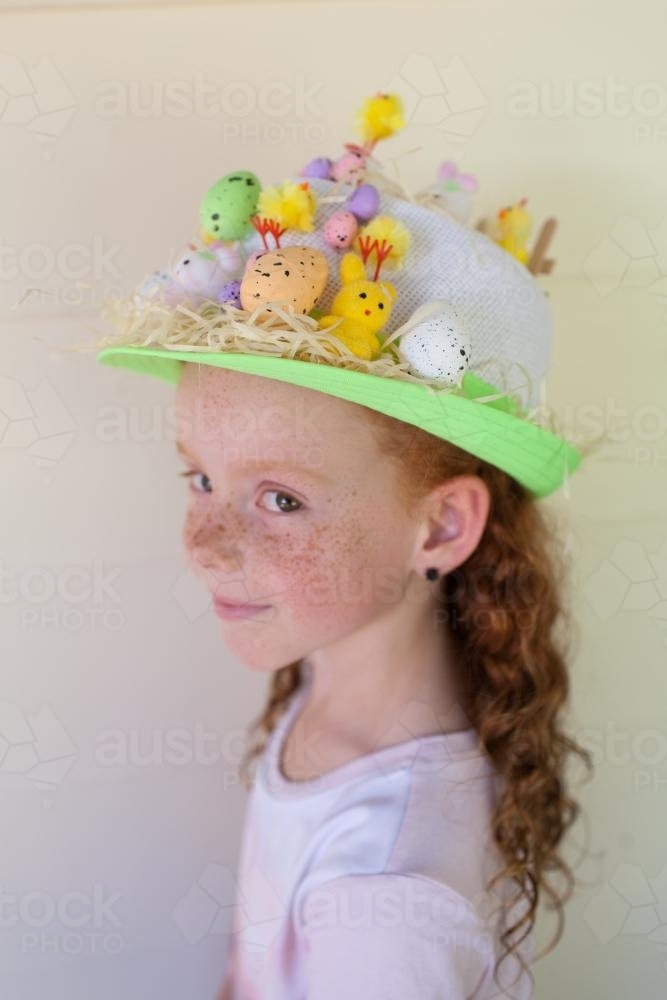 Young girl wearing an Easter hat - Australian Stock Image