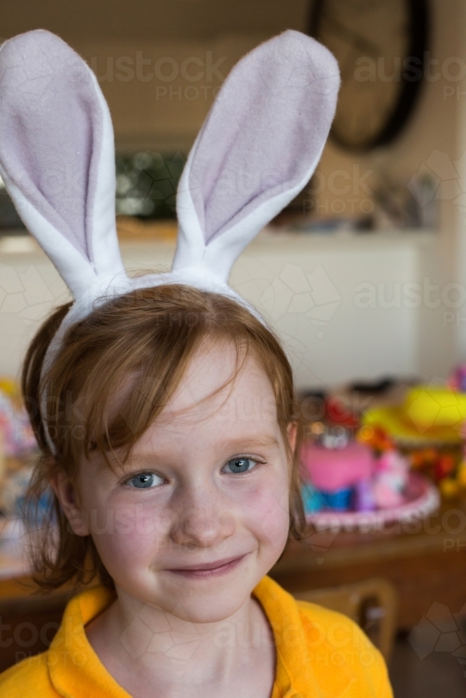young girl wearing rabbit ears - Australian Stock Image