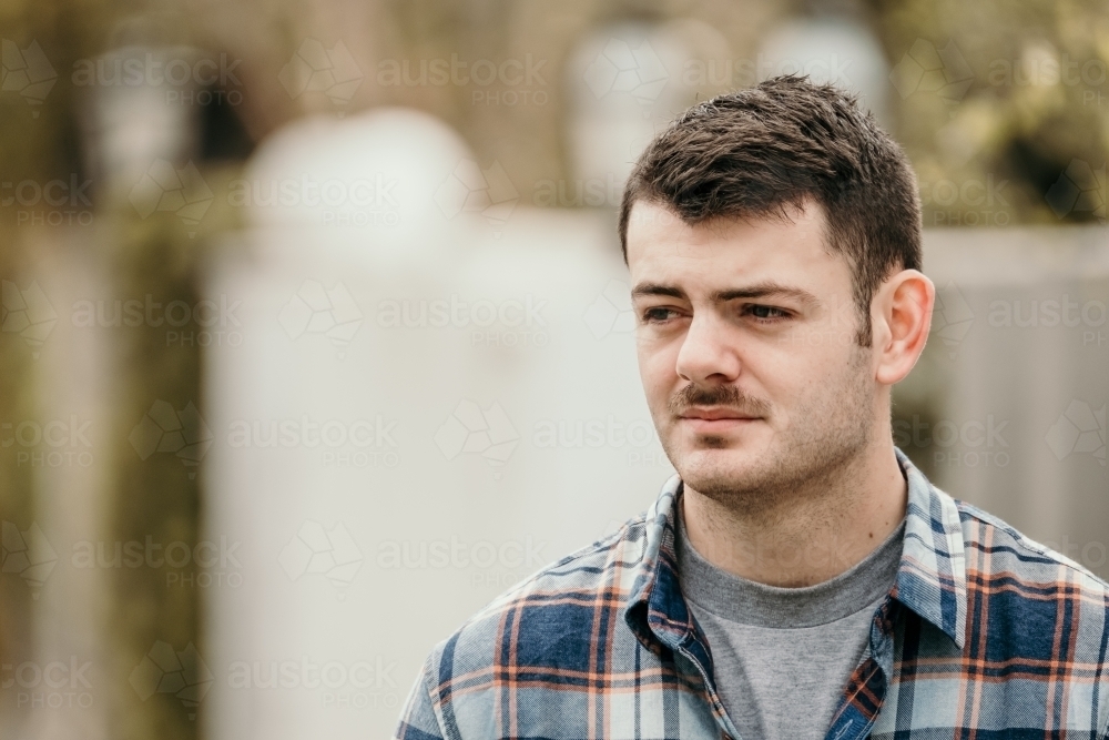 Young man in street. - Australian Stock Image