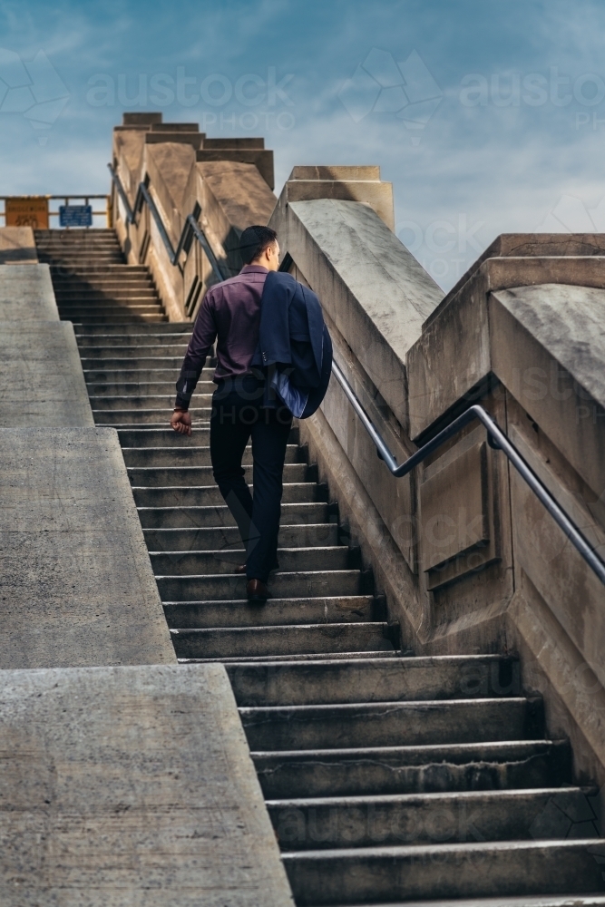 young man on stairs - Australian Stock Image