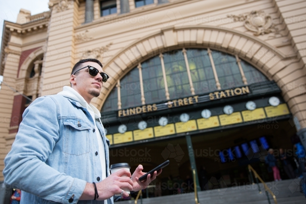 Young Man Waiting Outside Flinders Street Station - Australian Stock Image