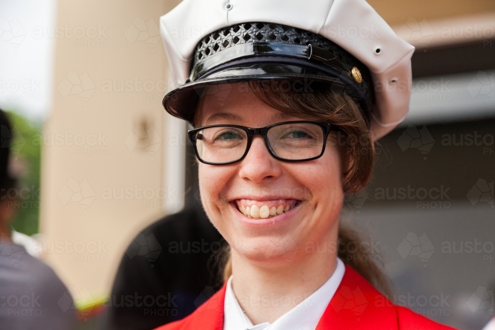 Young musician dressed in formal uniform for town band - Australian Stock Image