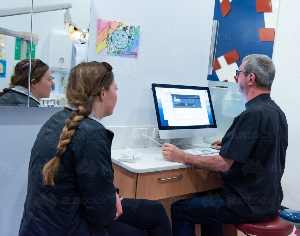 Young woman at consultation at dentist - Australian Stock Image