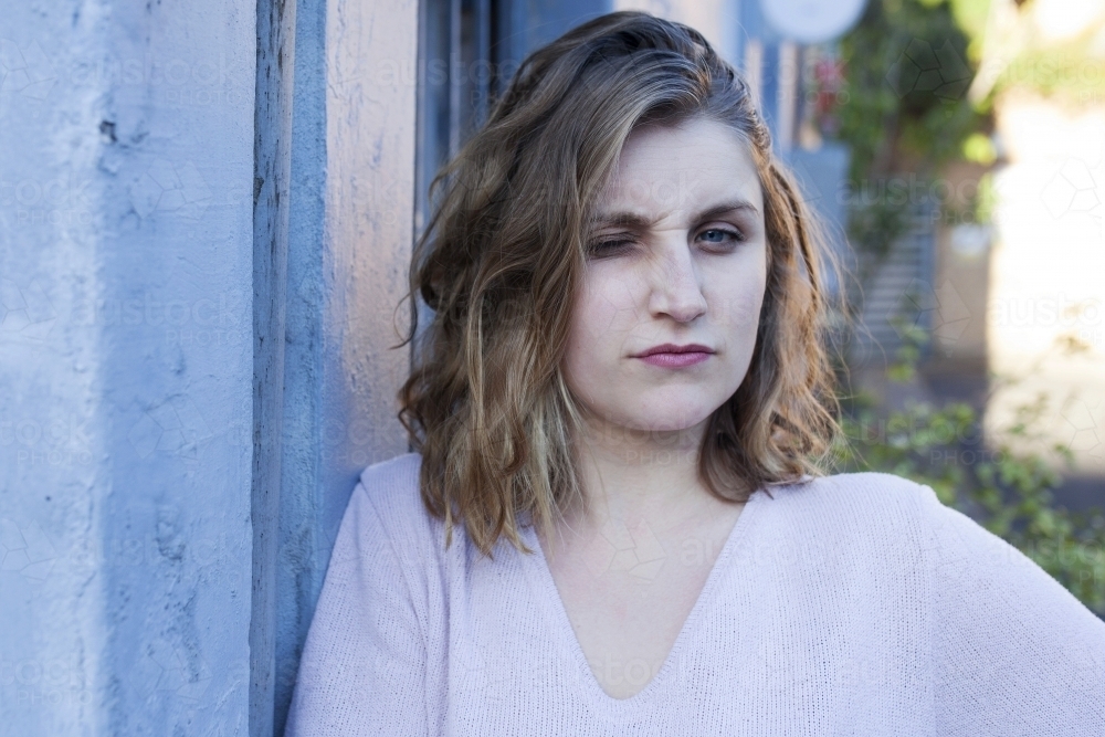 Young woman winking - Australian Stock Image