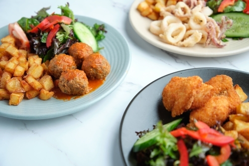 3 sets of plated salad meals - Australian Stock Image