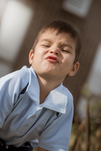 4 year old mixed race boy leaves home for his first day of preschool - Australian Stock Image