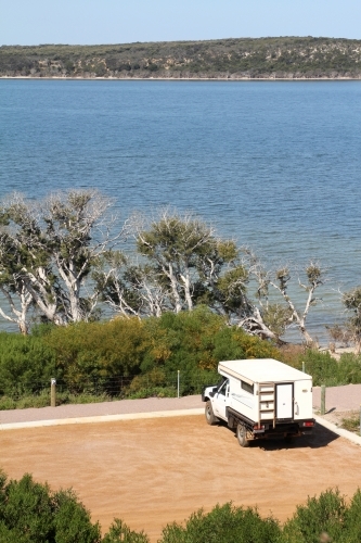 4WD camper parked near inlet - Australian Stock Image