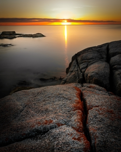 A Dramatic Sunrise at the Bay of Fires. - Australian Stock Image