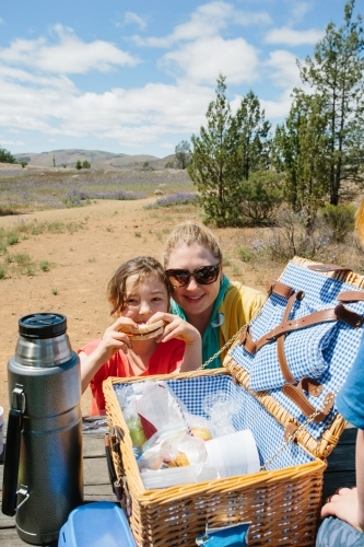 A family having a picnic at a rest area in a national park - Australian Stock Image