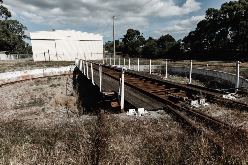 A historic railway train turntable used to move trains onto another track - Australian Stock Image