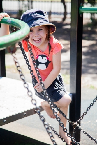 A kid playing at the playground - Australian Stock Image