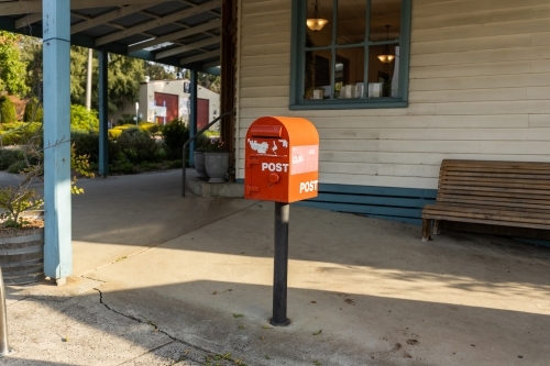 A red australia post letter box stripped of all branding and logos. - Australian Stock Image