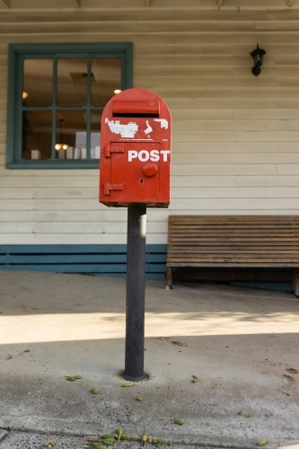 A red australia post letter box stripped of all branding and logos. - Australian Stock Image